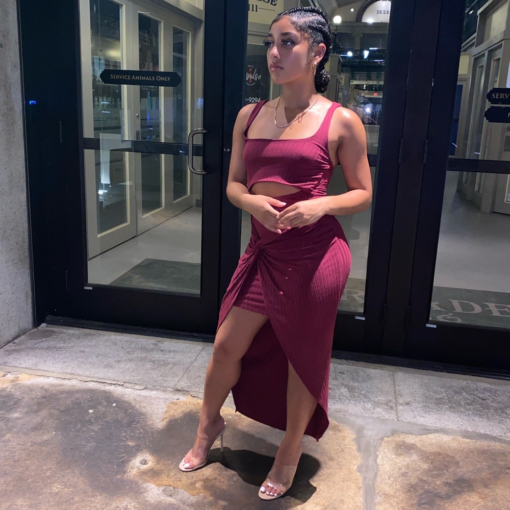 Burgundy dress with cut out.